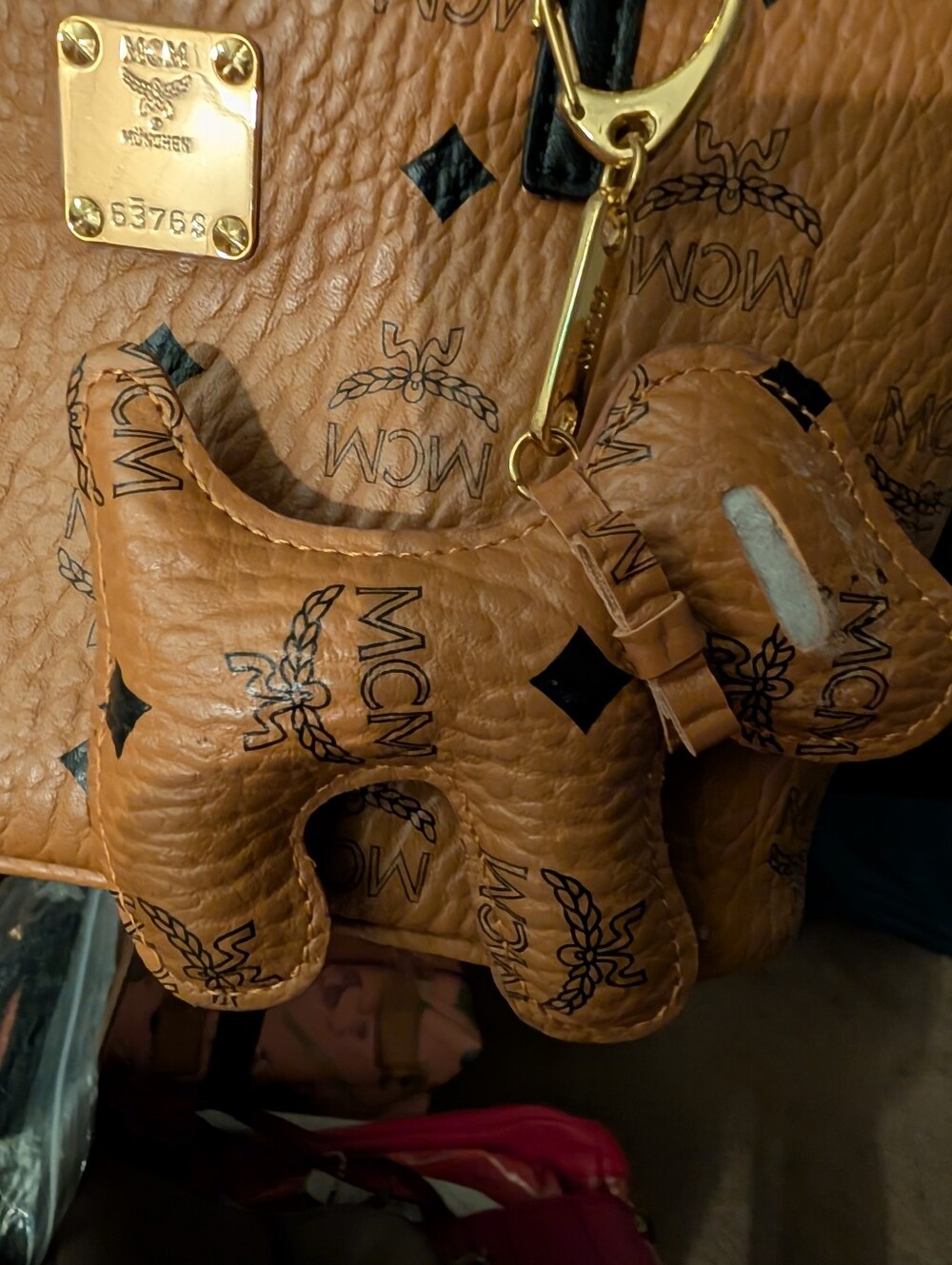 MCM Visetos Cognac Leather Mini Tote with Black Trim And Adorable Doggie Charm! - Picture 15 of 15